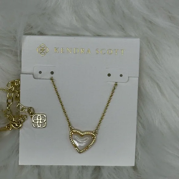 Kendra Scott Gold Heart Necklace with Ivory Mother of Pearl. - Picture 8 of 9